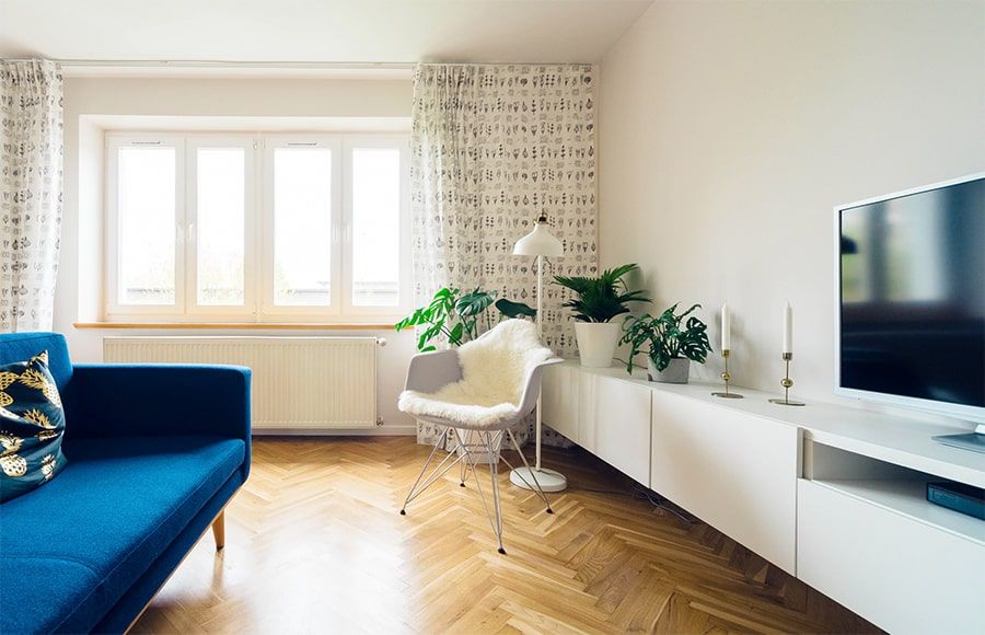 Bright, well-furnished living room ready for guests